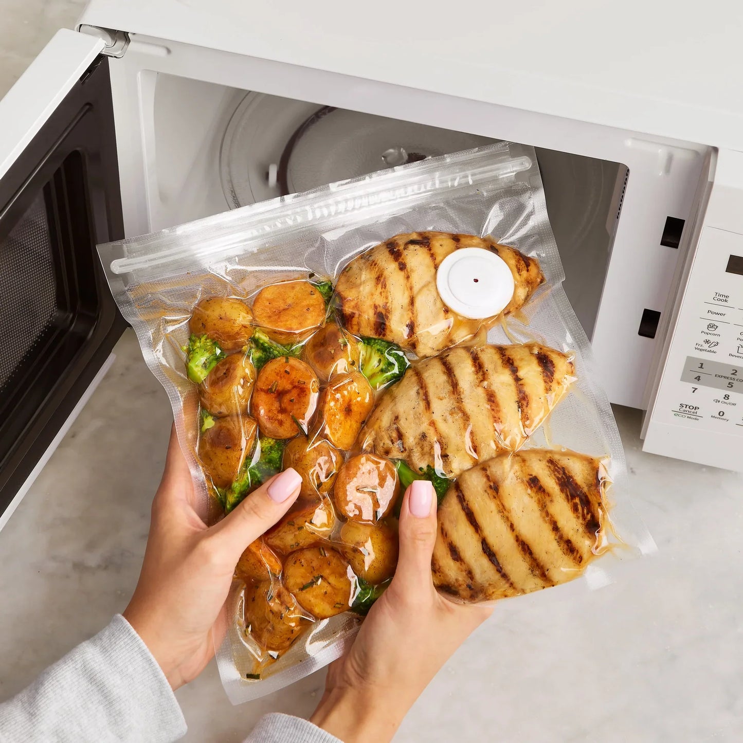 FreshLock™ | Si farvel til matsvinn – forsegl friskheten med ett trykk
